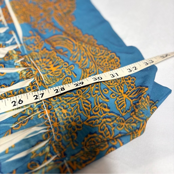 Sleeveless, floral print mini dress with a scoop neck and pleated details. - Picture 6 of 8